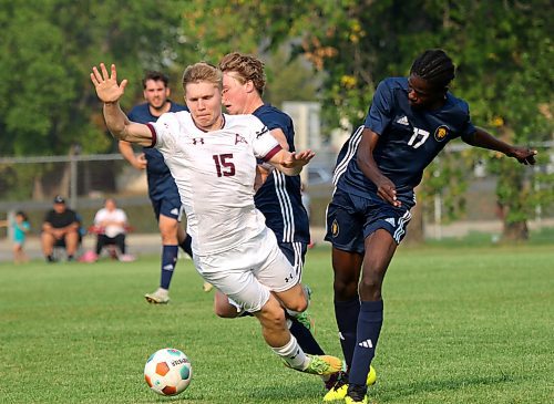 Assiniboine Cougars Dima Golovchenko takes on Brandon Bobcats Gregory Akhigbe during their MCAC men's soccer game on Tuesday. The Cougars secured their first-ever point against the Bobcats in a 0-0 draw. (Thomas Friesen/The Brandon Sun)