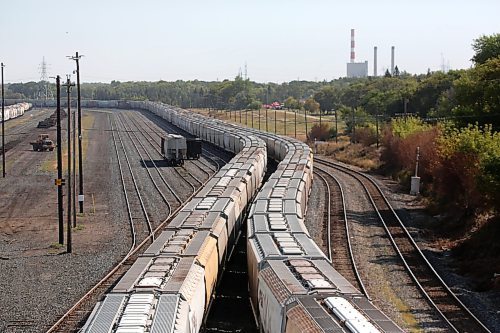 The cars of a pair of freight trains snake down the tracks of the Canadian Pacific train yard in Brandon on Monday afternoon. (Matt Goerzen/The Brandon Sun)