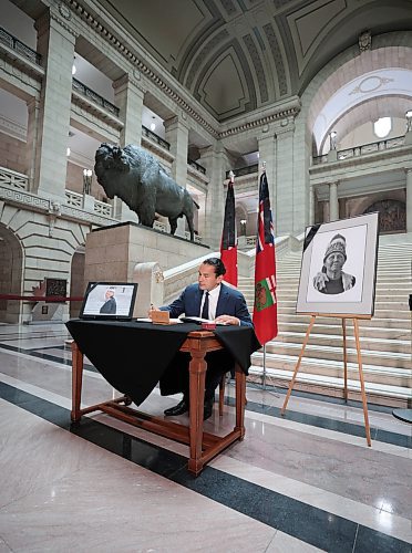 Ruth Bonneville / Free Press

Local  - book of condolences

Photo of Premier Wab Kinew, signing the book of condolences Tuesday. 

Manitoba's Lieutenant-Governor Anita Neville, Premier Wab Kinew, interim opposition Leader Wayne Ewasko and  Mayor Scott Gillingham, along with other elected officials, are the first to  sign book of condolences for the late grand chief Cathy Merrick at the legislature Tuesday.



Sept 10th,  2024