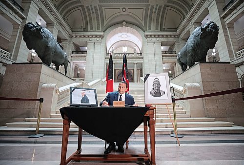 Ruth Bonneville / Free Press

Local  - book of condolences

Photo of Premier Wab Kinew, signing the book of condolences Tuesday. 

Manitoba's Lieutenant-Governor Anita Neville, Premier Wab Kinew, interim opposition Leader Wayne Ewasko and  Mayor Scott Gillingham, along with other elected officials, are the first to  sign book of condolences for the late grand chief Cathy Merrick at the legislature Tuesday.



Sept 10th,  2024