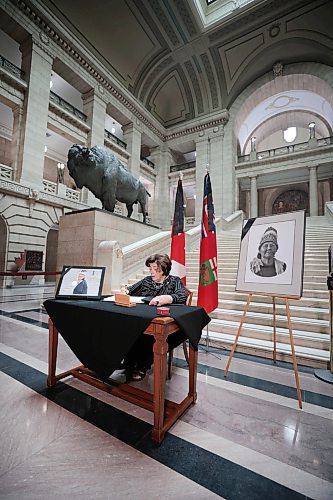 Ruth Bonneville / Free Press

Local  - book of condolences

Photo of Manitoba's Lieutenant-Governor Anita Neville, the first to sign the book of condolences Tuesday. 

Manitoba's Lieutenant-Governor Anita Neville, Premier Wab Kinew, interim opposition Leader Wayne Ewasko and  Mayor Scott Gillingham, along with other elected officials, are the first to  sign book of condolences for the late grand chief Cathy Merrick at the legislature Tuesday.



Sept 10th,  2024