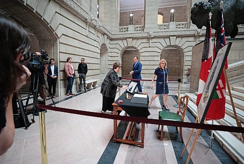 Ruth Bonneville / Free Press

Local  - book of condolences

Photo of Manitoba's Lieutenant-Governor Anita Neville, the first to sign the book of condolences Tuesday. 

Manitoba's Lieutenant-Governor Anita Neville, Premier Wab Kinew, interim opposition Leader Wayne Ewasko and  Mayor Scott Gillingham, along with other elected officials, are the first to  sign book of condolences for the late grand chief Cathy Merrick at the legislature Tuesday.



Sept 10th,  2024