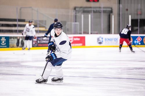 MIKAELA MACKENZIE / WINNIPEG FREE PRESS

Ville Heinola (14) during an informal preseason captain&#x573; skate at the Hockey For All Centre on Tuesday, Sept. 10, 2024. 

For Mike McIntyre story.
Winnipeg Free Press 2024