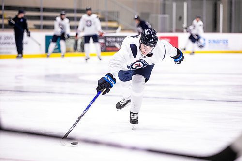 MIKAELA MACKENZIE / WINNIPEG FREE PRESS

Ville Heinola (14) during an informal preseason captain&#x573; skate at the Hockey For All Centre on Tuesday, Sept. 10, 2024. 

For Mike McIntyre story.
Winnipeg Free Press 2024