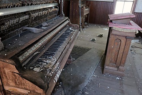 The piano in Berbank Memorial Church is seen in 2024. Bird droppings have covered the keys since it was photographed in 2017. (Connor McDowell/Brandon Sun)