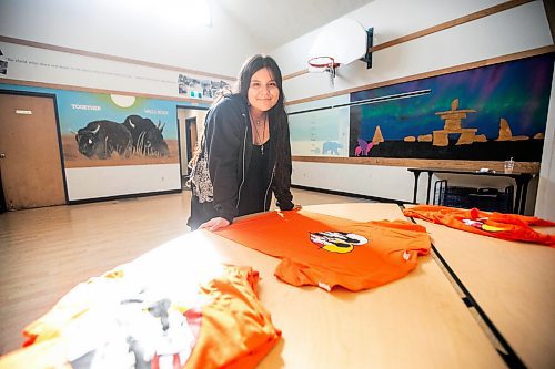 MIKAELA MACKENZIE / WINNIPEG FREE PRESS

Breanna Mink (16), who designed the orange shirt day t-shirts that Rossbrook House is selling to raise funds, at the inner-city drop-in centre on Thursday, Sept. 12, 2024. The unique design features the colours of the four directions and was created by a talented teenaged artist who has been a Rossbrook House participant for several years. Breanna is also one of the Junior Staff, a program that employs participants as young as 13 years of age.

Standup.
Winnipeg Free Press 2024