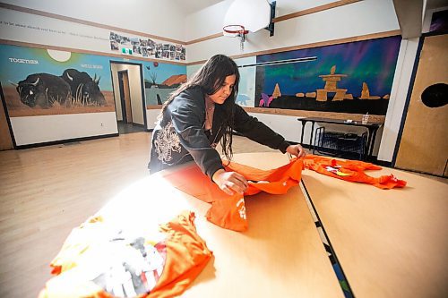 MIKAELA MACKENZIE / WINNIPEG FREE PRESS

Breanna Mink (16), who designed the orange shirt day t-shirts that Rossbrook House is selling to raise funds, at the inner-city drop-in centre on Thursday, Sept. 12, 2024. The unique design features the colours of the four directions and was created by a talented teenaged artist who has been a Rossbrook House participant for several years. Breanna is also one of the Junior Staff, a program that employs participants as young as 13 years of age.

Standup.
Winnipeg Free Press 2024