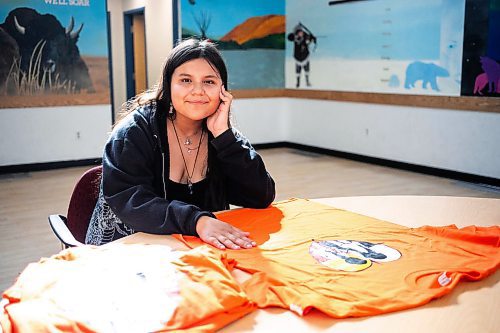 MIKAELA MACKENZIE / WINNIPEG FREE PRESS

Breanna Mink (16), who designed the orange shirt day t-shirts that Rossbrook House is selling to raise funds, at the inner-city drop-in centre on Thursday, Sept. 12, 2024. The unique design features the colours of the four directions and was created by a talented teenaged artist who has been a Rossbrook House participant for several years. Breanna is also one of the Junior Staff, a program that employs participants as young as 13 years of age.

Standup.
Winnipeg Free Press 2024