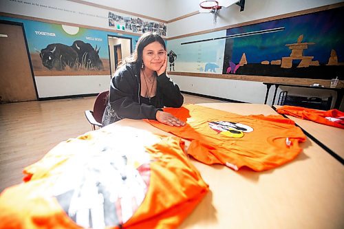 MIKAELA MACKENZIE / WINNIPEG FREE PRESS

Breanna Mink (16), who designed the orange shirt day t-shirts that Rossbrook House is selling to raise funds, at the inner-city drop-in centre on Thursday, Sept. 12, 2024. The unique design features the colours of the four directions and was created by a talented teenaged artist who has been a Rossbrook House participant for several years. Breanna is also one of the Junior Staff, a program that employs participants as young as 13 years of age.

Standup.
Winnipeg Free Press 2024