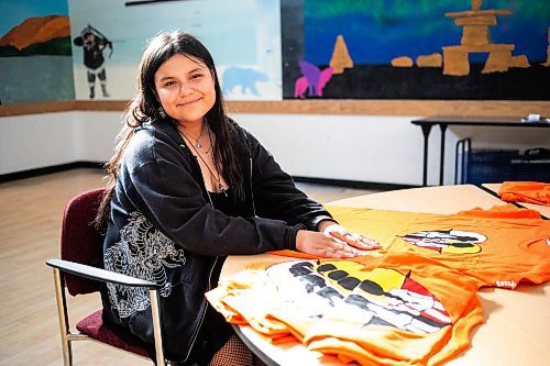 MIKAELA MACKENZIE / WINNIPEG FREE PRESS

Breanna Mink (16), who designed the orange shirt day t-shirts that Rossbrook House is selling to raise funds, at the inner-city drop-in centre on Thursday, Sept. 12, 2024. The unique design features the colours of the four directions and was created by a talented teenaged artist who has been a Rossbrook House participant for several years. Breanna is also one of the Junior Staff, a program that employs participants as young as 13 years of age.

Standup.
Winnipeg Free Press 2024