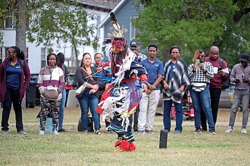 Powwow dancer Sam Jackson from Sioux Valley Dakota Nation offers a dance demonstration for newcomers to Canada during a free community barbecue at Stanley Park on Friday, part of a Welcoming Week event hosted by the Brandon Local Immigration Partnership. (Matt Goerzen/The Brandon Sun)