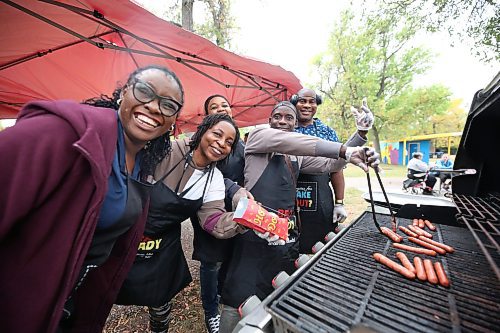 Westman Immigrant Services volunteer co-ordinator Efemena Esosuakpo (from left) is joined by a group of volunteers from the Nigerian community in Brandon, including Joan Ojo, Joy Oki, Joseph Adedayo and Solomon Oyeniran, to help run a free community barbecue at Stanley Park on Friday, part of a Welcoming Week event hosted by the Brandon Local Immigration Partnership. (Matt Goerzen/The Brandon Sun)