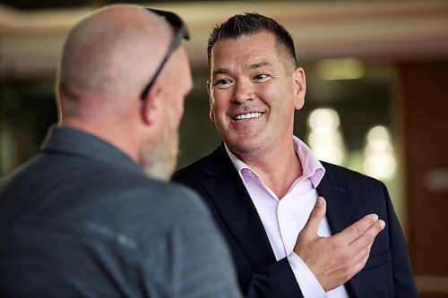 Incoming Brandon Police Chief Tyler Bates speaks with Ward 10 City of Brandon Coun. Tyson Tame during a meet and greet event with the new chief at Brandon City Hall on Friday afternoon. (Matt Goerzen/The Brandon Sun)