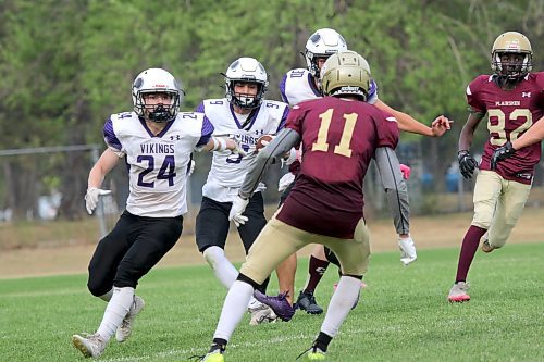 Vikings Ryder Desjardin (24), Kristian Williamson (9) and Cole Vandenberghe (30) all intercepted passes during the victory. (Thomas Friesen/The Brandon Sun)