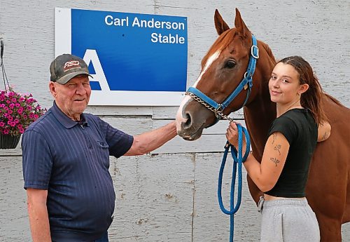 George Williams / Winnipeg Free Press
Trainer Carl Anderson with winner Silver Sign and her groom Lisa Deboynton.
