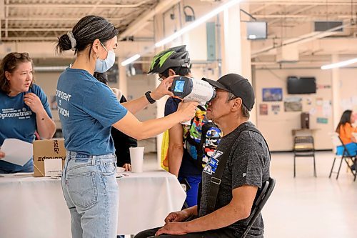 Mike Sudoma/Free Press
Dr Melina Choi checks Odilion Ermin's vision as the Manitoba Association of Optometrists carries out free eye exams as part of the Gizhe Waa Ti-Sii-Win Service Expo Friday
Sept 13, 2024
