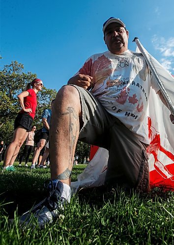 JOHN WOODS / FREE PRESS
Carlisle Settee, a cousin of Terry Fox who has tattooed Terry&#x2019;s artificial leg on his leg, waits for the start of Terry Fox Run at Assiniboine Park Sunday, September 15, 2024. 

Reporter: tyler