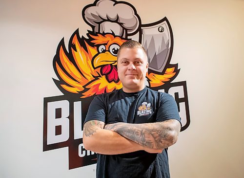 BROOK JONES / FREE PRESS
Thirty-year-old Eric Saniuk who is the owner of Blazing Chicken Shack is pictured at his restaurant at 392 Graham Ave., in Winnipeg, Man., Monday, Sept. 16, 2024. Saniuk hosted a grand opening Friday, Sept. 13, 2024.