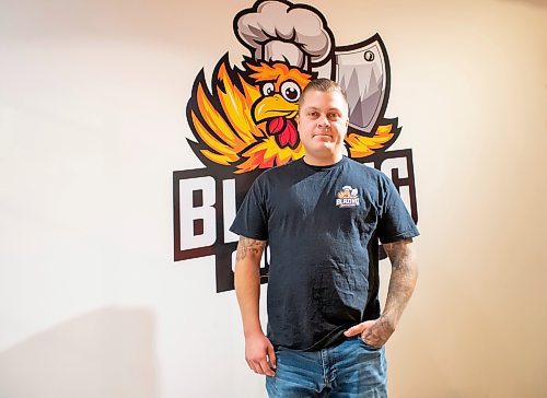 BROOK JONES / FREE PRESS
Thirty-year-old Eric Saniuk who is the owner of Blazing Chicken Shack is pictrued at his restaurant at 392 Graham Ave., in Winnipeg, Man., Monday, Sept. 16, 2024. Saniuk hosted a grand opening Friday, Sept. 13, 2024.