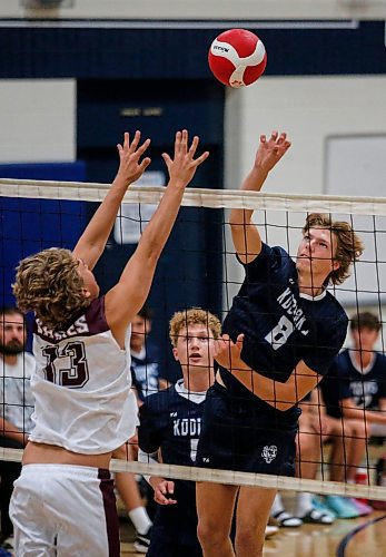 JOHN WOODS / FREE PRESS
River East Tanner Nachtigall (8) hits against Springfield Vann Janas (13) in varsity volleyball action at River east Collegiate Monday, September 16, 2024. 

Reporter: s/u