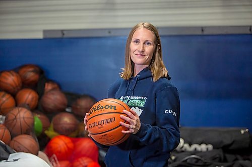 BROOK JONES / FREE PRESS
Thirty-six-year-old Carrissa Reyes is a volunteer coach with the 7-8 coed South Winnipeg Trailblazers basketball team that plays in the Winnipeg Minor Basketball Association community league. Reyes who is also a volunteer director on the board of the WMBA is pictured holding a basketball at the South Winnipeg Community Centre Waverley Site in Winnipeg, Man., Monday, Sept. 16, 2024.