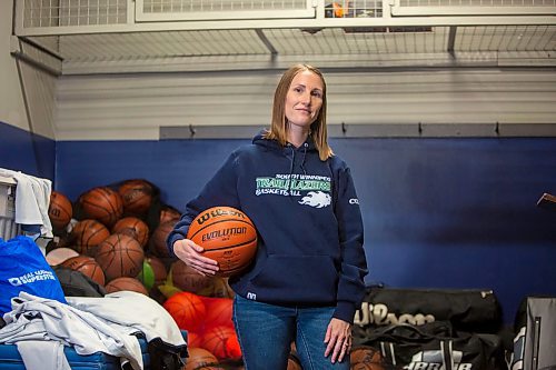 BROOK JONES / FREE PRESS
Thirty-six-year-old Carrissa Reyes is a volunteer coach with the 7-8 coed South Winnipeg Trailblazers basketball team that plays in the Winnipeg Minor Basketball Association community league. Reyes who is also a volunteer director on the board of the WMBA is pictured holding a basketball at the South Winnipeg Community Centre Waverley Site in Winnipeg, Man., Monday, Sept. 16, 2024.