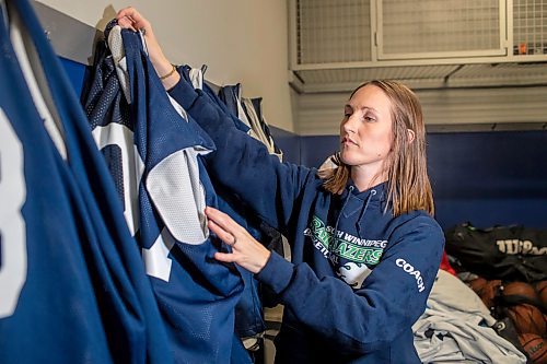 BROOK JONES / FREE PRESS
Thirty-six-year-old Carrissa Reyes is a volunteer coach with the 7-8 coed South Winnipeg Trailblazers basketball team that plays in the Winnipeg Minor Basketball Association community league. Reyes who is also a volunteer director on the board of the WMBA is pictured organizing basketball team jerseys in a basketball storage room at the South Winnipeg Community Centre Waverley Site in Winnipeg, Man., Monday, Sept. 16, 2024.