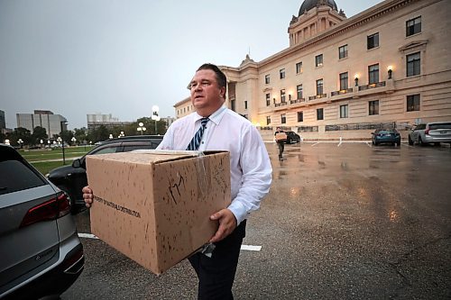 Ruth Bonneville / Free Press

LOCAL - NDP Mark Wasyliw Packs bags

NDP MLA Fort Garry, Mark Wasyliw,  walks out of the Legislative Building with boxes Monday after dispute with the NDP leader, Wab Kinew.  On his way to his car in the rain carrying one of several boxes to be loaded he says that Kinew needs help and that he's glad to be gone.  

See story by Kevin.  

Sept 13th,  2024