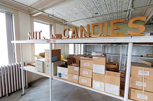 MIKE DEAL / FREE PRESS
Shelves of old office supplies with a wooden display that would have said, &#x201c;Nuts and Candies.&#x201d;
Nutty Club office building at 149 Pioneer Ave, where everything is getting ready to be put up for auction.
240910 - Tuesday, September 10, 2024.