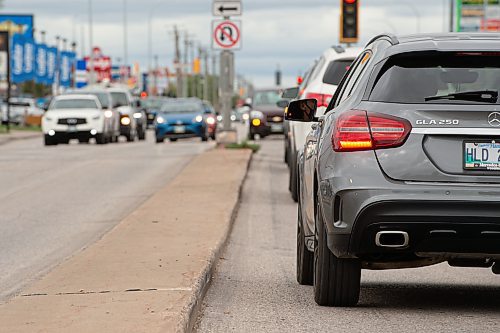 MIKE SUDOMA / Winnipeg Free Press

Late afternoon traffic waits at a red light on McPhillips St Monday.

August 23, 2021