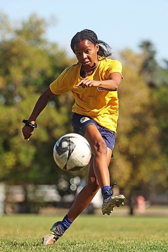 Keashae Masters takes a shot on net while practising with Brandon Bobcats teammate Victoria Gonzalez on Tuesday afternoon at the BU soccer field, hours before the Bobcats team practice. (Tim Smith/The Brandon Sun)