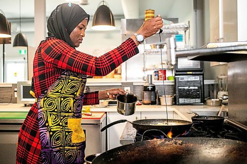 MIKAELA MACKENZIE / WINNIPEG FREE PRESS

Ganiyat Oyesomi-Daibu makes spicy Sichuan fried noodles at Wang Dao Bistro in Morden on Wednesday, Sept. 11, 2024. 

For AV story.
Winnipeg Free Press 2024