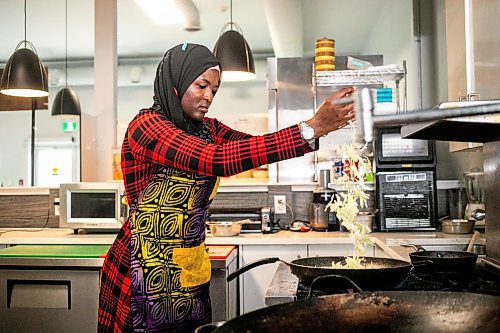 MIKAELA MACKENZIE / WINNIPEG FREE PRESS

Ganiyat Oyesomi-Daibu makes spicy Sichuan fried noodles at Wang Dao Bistro in Morden on Wednesday, Sept. 11, 2024. 

For AV story.
Winnipeg Free Press 2024