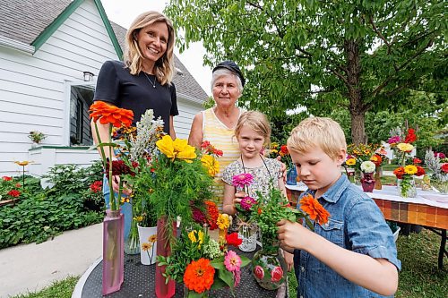 MIKE DEAL / FREE PRESS
(From left); Monika daughter, Erika Neumann grandmother, Ellianna granddaughter and Theo grandson.
Three generations of a family in Wolseley are using their love of flowers to brighten the day for others by selling the flowers grown in their yard to raise money for Harvest Manitoba.
Reporter: Janine LeGal
240906 - Friday, September 06, 2024.