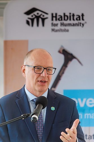 MIKE DEAL / FREE PRESS
Mayor Scott Gillingham speaks during a ceremony where Habitat for Humanity Manitoba handed over keys to the first fifteen of 55 families that will be living in the Pandora Avenue West development in Transcona. 
Reporter: Aaron Epp
240918 - Wednesday, September 18, 2024.