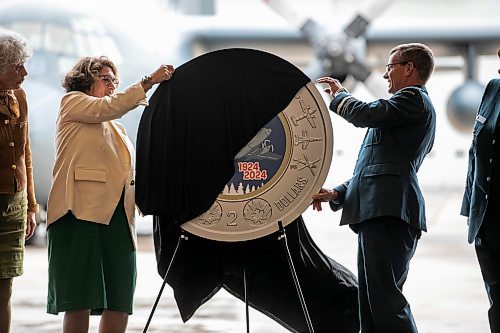 MIKAELA MACKENZIE / WINNIPEG FREE PRESS

Marie Lemay, president and CEO of the Royal Canadian Mint (left), and lieutenant-general Eric Kenny, commander of the Royal Canadian Air Force, reveal a special two&#x2011;dollar circulation coin commemorating the 100th anniversary of the Royal Canadian Air Force on Wednesday, Sept. 18, 2024.

Standup.
Winnipeg Free Press 2024