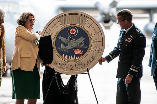 MIKAELA MACKENZIE / WINNIPEG FREE PRESS

Marie Lemay, president and CEO of the Royal Canadian Mint (left), and lieutenant-general Eric Kenny, commander of the Royal Canadian Air Force, reveal a special two&#x2011;dollar circulation coin commemorating the 100th anniversary of the Royal Canadian Air Force on Wednesday, Sept. 18, 2024.

Standup.
Winnipeg Free Press 2024