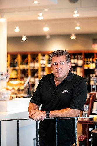 MIKAELA MACKENZIE / WINNIPEG FREE PRESS

Scott Holden, co-owner of The Pourium, in the wine store on Wednesday, Sept. 18, 2024.

For Malak story.
Winnipeg Free Press 2024