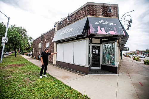 MIKAELA MACKENZIE / WINNIPEG FREE PRESS

Scott Holden, co-owner of The Pourium, shows where a thief broke in to steal wine on Wednesday, Sept. 18, 2024.

For Malak story.
Winnipeg Free Press 2024