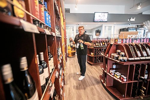 MIKAELA MACKENZIE / WINNIPEG FREE PRESS

Scott Holden, co-owner of The Pourium, shows some of the bottles that were stolen on Wednesday, Sept. 18, 2024.

For Malak story.
Winnipeg Free Press 2024