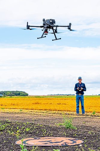 NIC ADAM / FREE PRESS
Agriculture student Tanner West gives a demonstration on how to use drones for various farming implements at Innovation Farms Tuesday.
240826 - Monday, August 26, 2024.

Reporter: Gabby