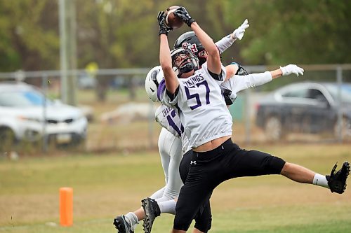 Zach Boryskiewich intercepts a pass in the end zone late in the first half. (Tim Smith/The Brandon Sun)