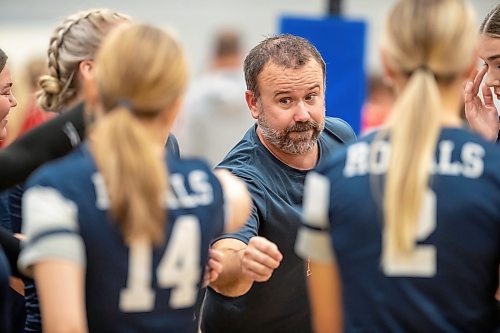 BROOK JONES / FREE PRESS
The Lord Selkirk Royals varsity girls volleyball team earned a victory over the visiting Mennonite Brethren Hawks in three straights sets (25-9, 25-11, 25-12-) in KPAC Tier 1 volleyball action at the Sellkirk Comp in Selkirk, Man., Wednesday, Sept. 18, 2024. Pictured: Selkirk Royals head coach Chad Whiteside gives his players fist bumps as they huddle around him.