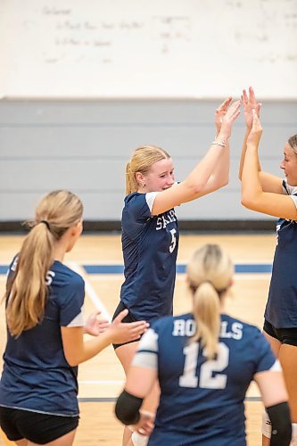 BROOK JONES / FREE PRESS
The Lord Selkirk Royals varsity girls volleyball team earned a victory over the visiting Mennonite Brethren Hawks in three straight sets (25-9, 25-11, 25-12-) in KPAC Tier 1 volleyball action at the Sellkirk Comp in Selkirk, Man., Wednesday, Sept. 18, 2024. Pictured: Selkirk Royals Paige Whiteside (left) and Rebecca Stutsky (right) give each other high fivecs during the third set.