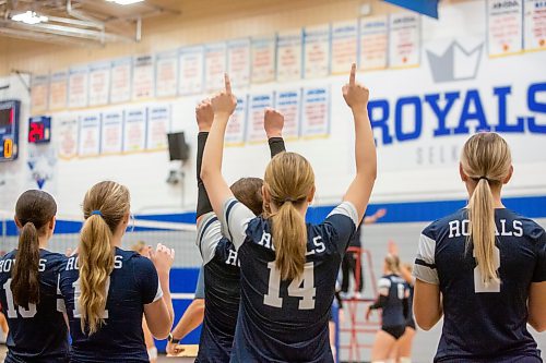 BROOK JONES / FREE PRESS
The Lord Selkirk Royals varsity girls volleyball team earned a victory over the visiting Mennonite Brethren Hawks in three straight sets (25-9, 25-11, 25-12-) in KPAC Tier 1 volleyball action at the Sellkirk Comp in Selkirk, Man., Wednesday, Sept. 18, 2024. Pictured: Players with the Selkirk Royals cheer on their teammates during first set action.