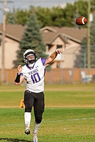 19092024
Quarterback Colten Malyon #10 of the Vincent Massey Vikings throws a pass during high school football action against the Coll&#xe8;ge Sturgeon Heights Collegiate Huskies at VMHS on Thursday afternoon.
(Tim Smith/The Brandon Sun)