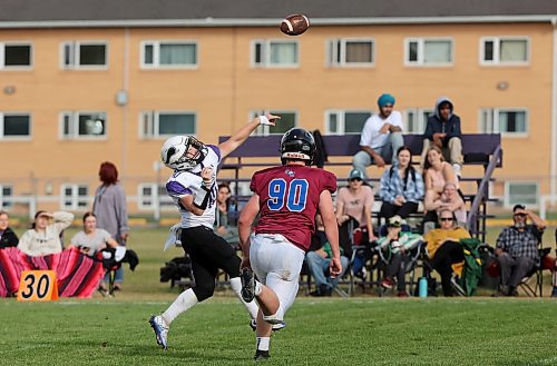 19092024
Quarterback Colten Malyon #10 of the Vincent Massey Vikings throws a pass during high school football action against the Coll&#xe8;ge Sturgeon Heights Collegiate Huskies at VMHS on Thursday afternoon.
(Tim Smith/The Brandon Sun)