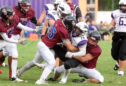 19092024
Brayden Smith #28 of the Vincent Massey Vikings is tackled with the ball during high school football action against the Coll&#xe8;ge Sturgeon Heights Collegiate Huskies at VMHS on Thursday afternoon.
(Tim Smith/The Brandon Sun)