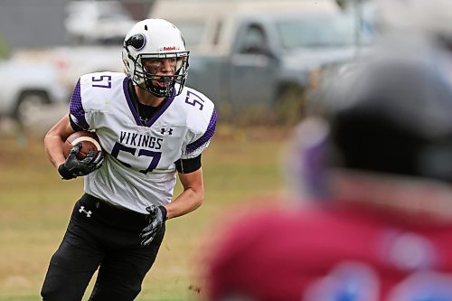 19092024
Zach Boryskiewich #57 of the Vincent Massey Vikings runs the ball after an interception during high school football action against the Coll&#xe8;ge Sturgeon Heights Collegiate Huskies at VMHS on Thursday afternoon.
(Tim Smith/The Brandon Sun)