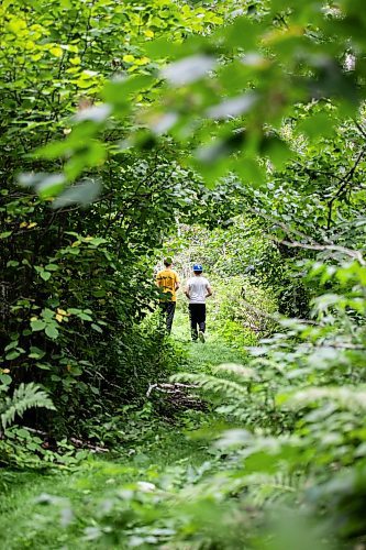 MIKAELA MACKENZIE / WINNIPEG FREE PRESS

Lockport School grade nine students Logan Fiebelkorn (left) and Wyatt Olson walk the trail at the grand opening of Lord Selkirk School Division&#x573; Albert Beach Trail field trip site on Thursday, Sept. 19, 2024.

For Maggie story.
Winnipeg Free Press 2024